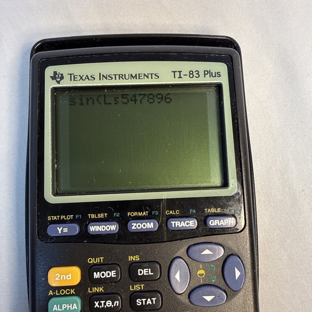 Texas Instruments TI-83 Handheld Graphing Calculator - Picture 4 of 10
